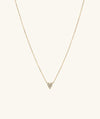 Mini Heart Pavé Diamond Necklace featuring a gold chain and a heart-shaped pendant encrusted with diamonds.