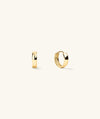 Gold Huggie Hoops, formerly Bold Hoops, shown in close-up, highlighting their stylish design and elegant craftsmanship. Perfect for elevating any outfit.
